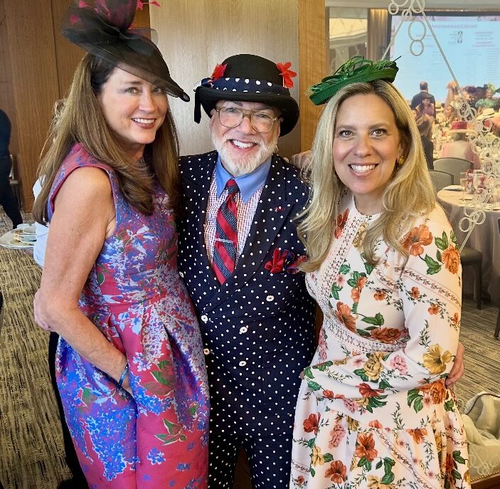 Jean Antoniou and Sharyl Mackey with Greg Hyder, who won one of the Best Hat Awards. (Photo by Mila Samokhina)